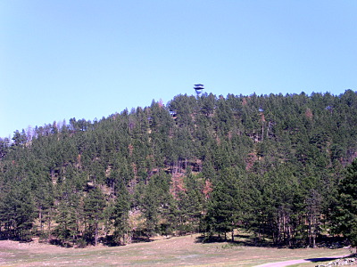 [Fire tower as seen from bottom of hill.]